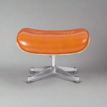 Front view of Charles Eames Ottoman in Camel Brown Waxed Leather with Chrome Base