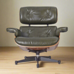 Lounge chair Charles and Ray Eames in waxy dark green leather with rosewood frame