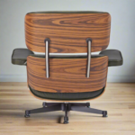 Side view of lounge chair Charles and Ray Eames showing ergonomic design and swivel base